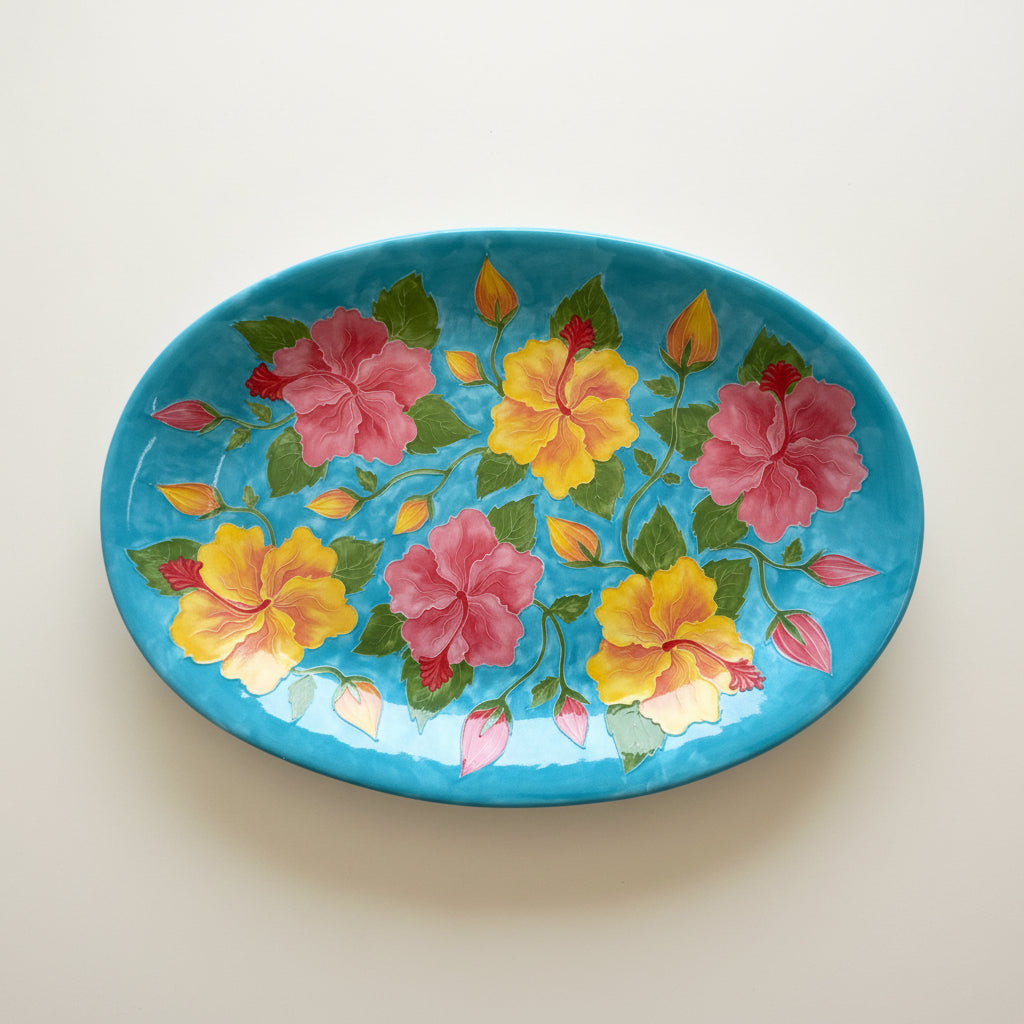 Decorative plate with floral design on a blue background