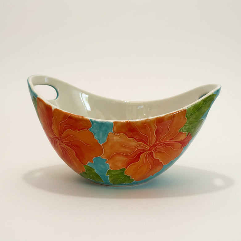 Decorative ceramic bowl with floral design on a white background