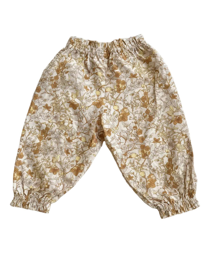 A pair of floral print baby pants