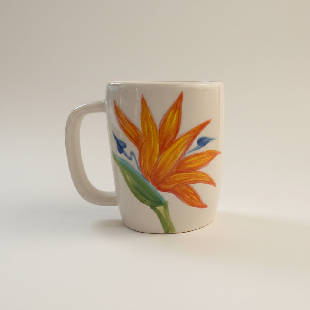 Two mugs with floral designs on a white background