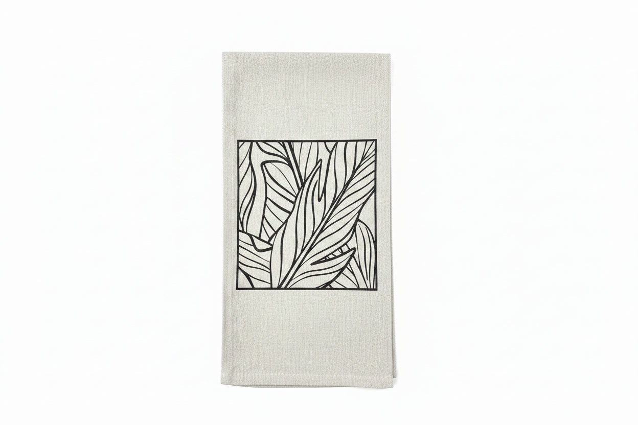 Textile product with leaf pattern and 'PLH' label on a white background