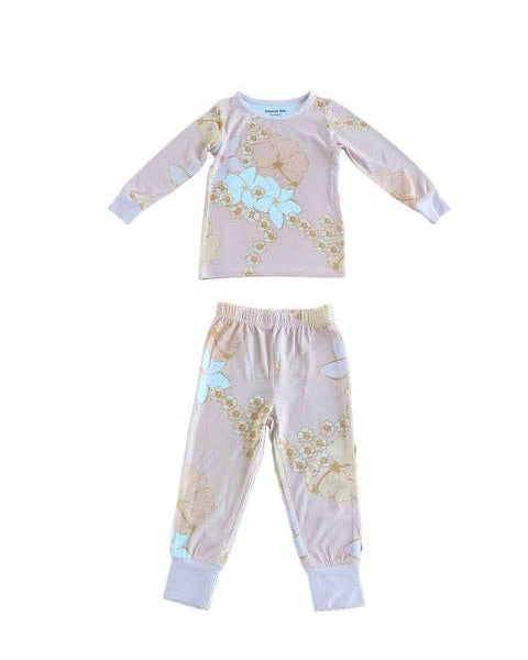 Children's pajama set with floral pattern on a white background