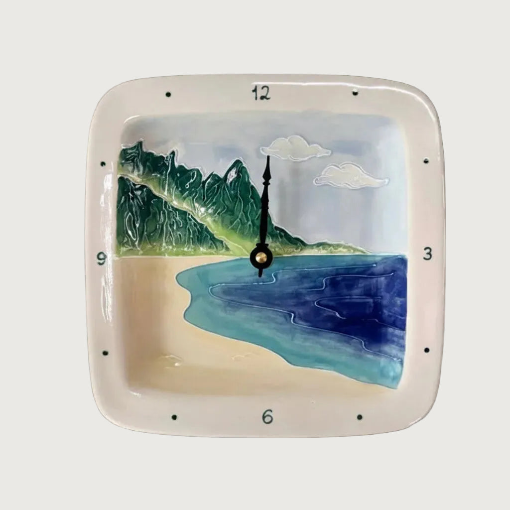 Square shaped hand painted clock depicting mountain range "Bali Hai" from the north shore of Kauai