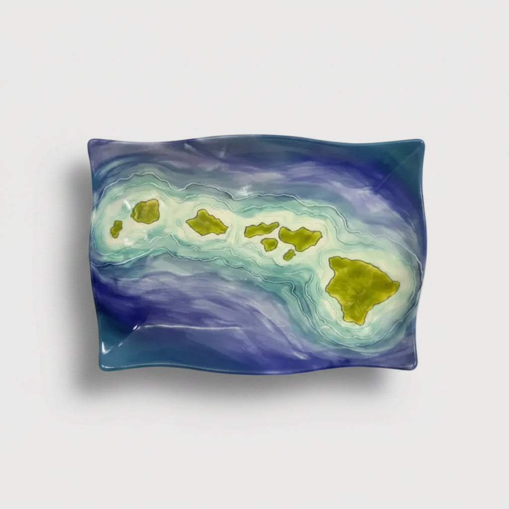 Decorative plate with a map of Hawaii on a blue and green background