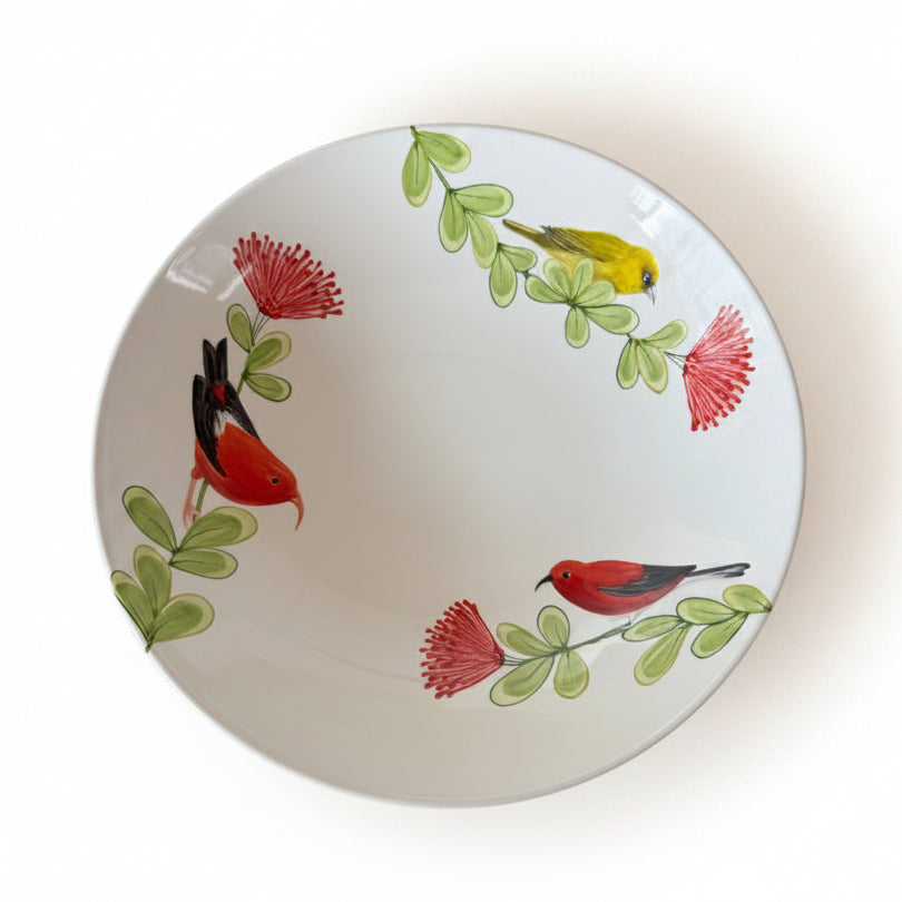 Decorative plate with birds and flowers on a white background