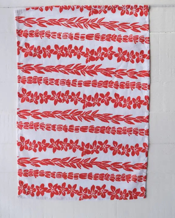 Towel with red floral pattern on a white background