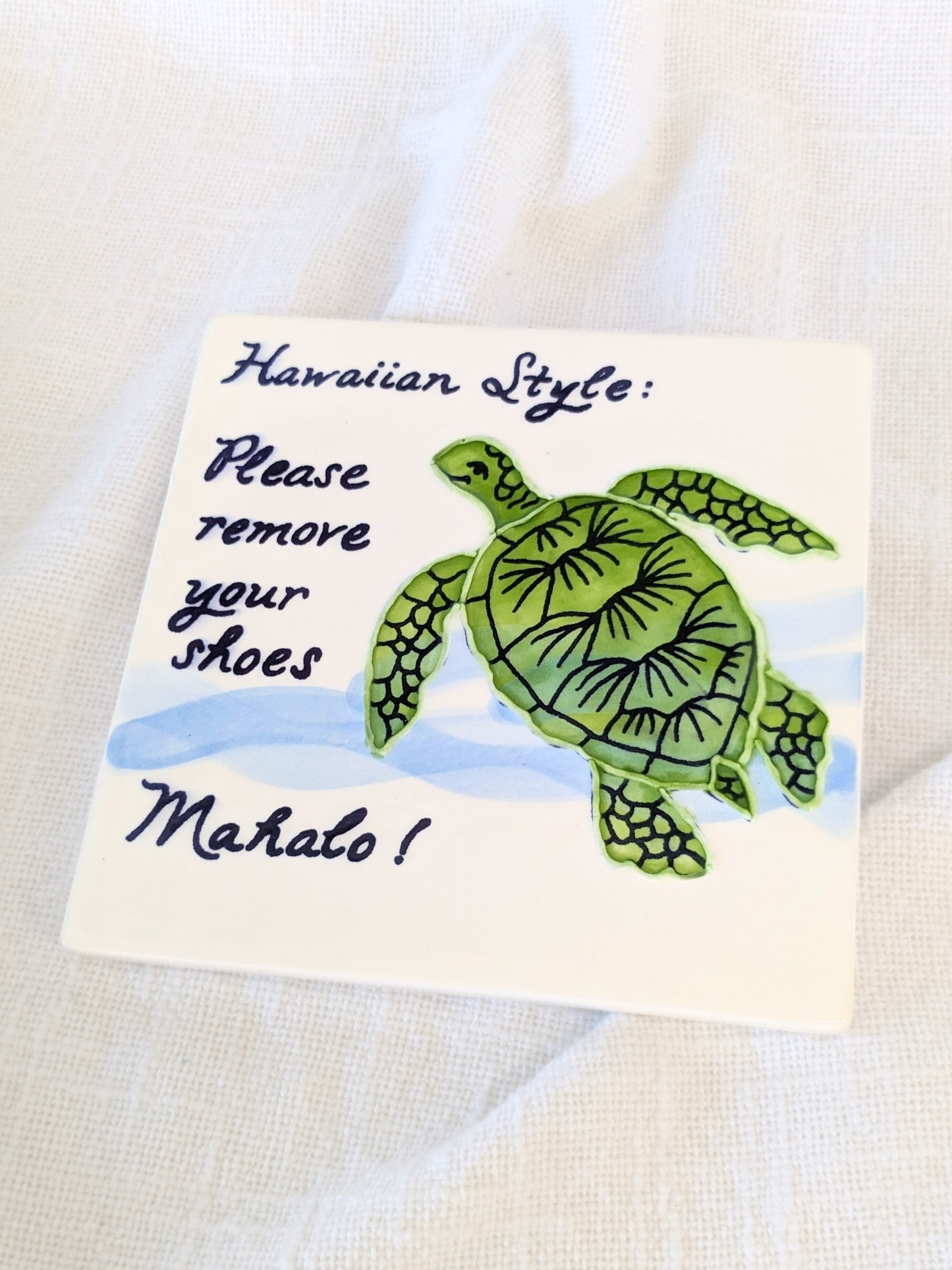Embossed Turtle Remove Shoes Tile 6"