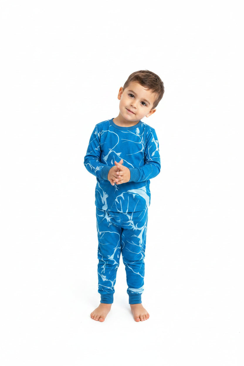 Children's blue leaf-patterned pajama set on a white background