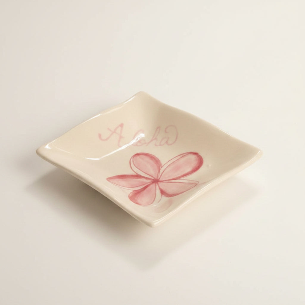 ceramic sauce dish with pink plumeria