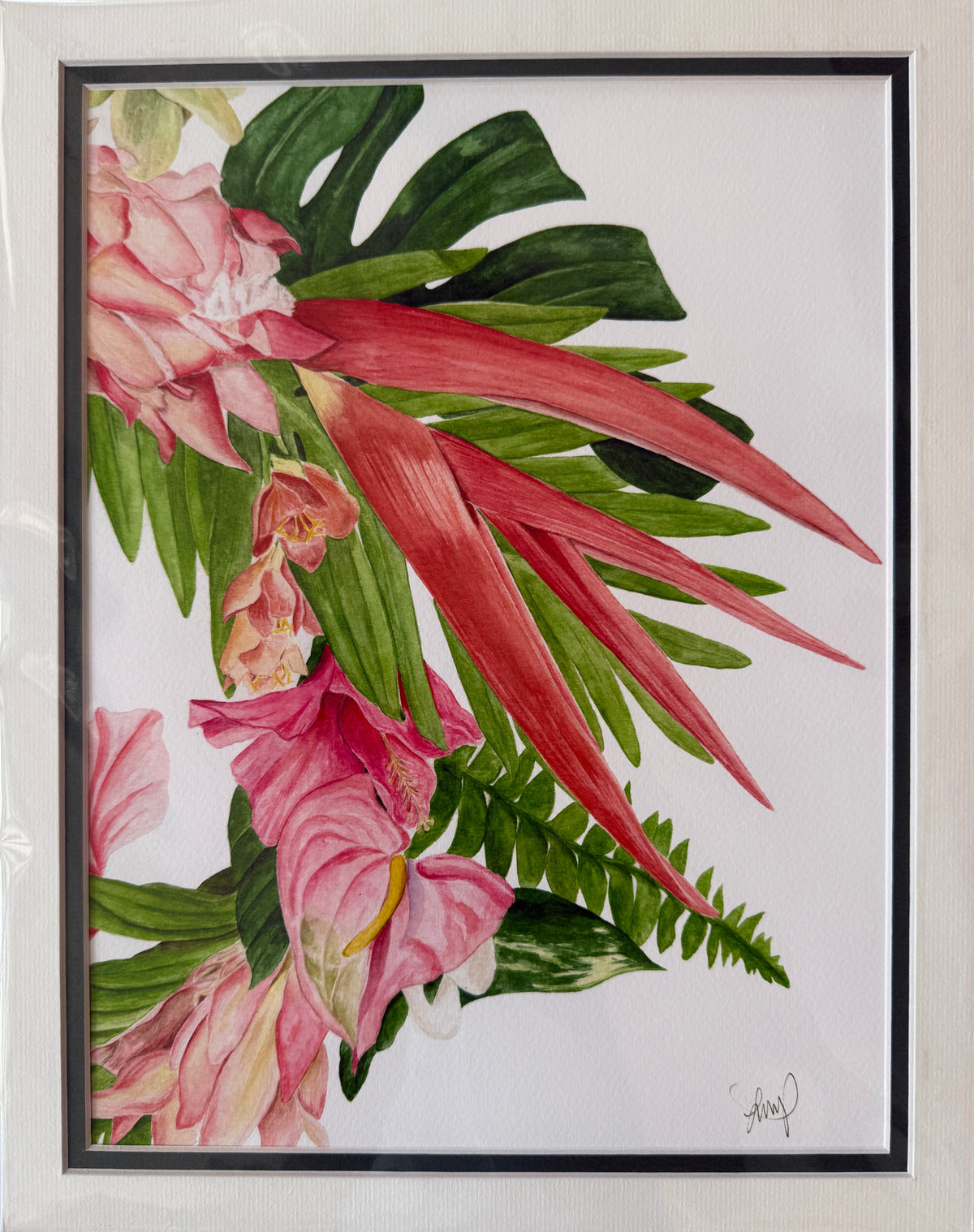 A framed botanical art print featuring pink flowers and green tropical leaves, including a prominent red-brown sword-like leaf, set in a white frame with a black inner border.